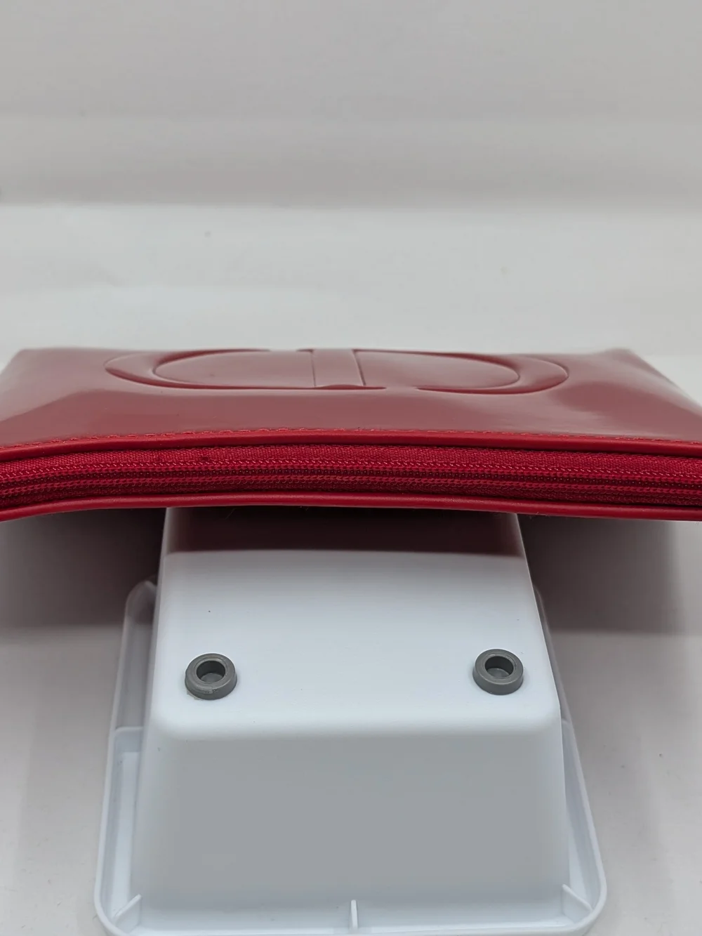 Red Patent Cosmetic Pouch — Designer Embossed Logo